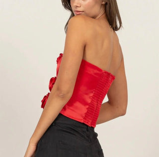 STRAPLESS SATIN TOP WITH ROSE DETAILS